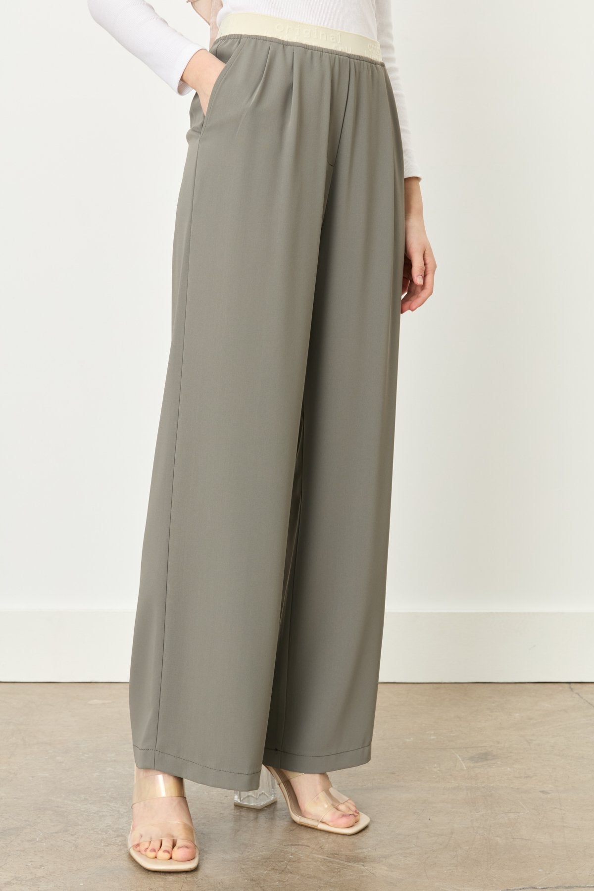 beli-lastik-detayli-pileli-pantolon-haki-248727.jpg