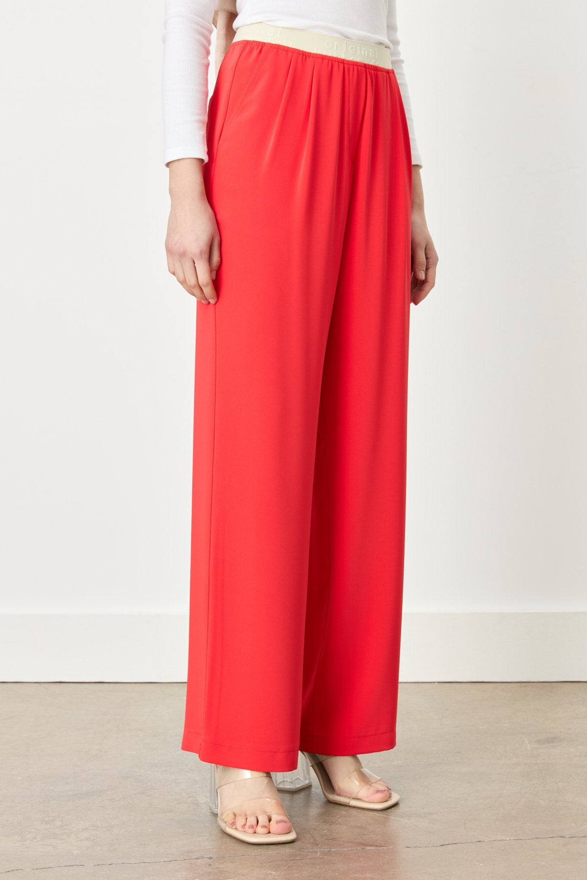 beli-lastik-detayli-pileli-pantolon-mercan-248735.jpg
