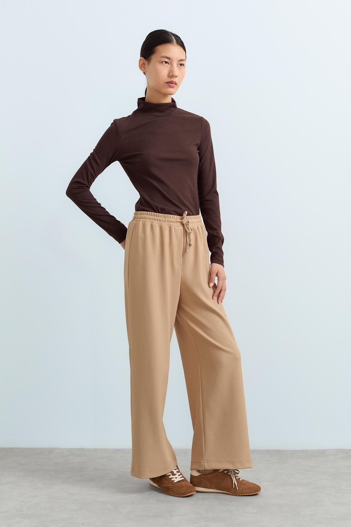 beli-lastikli-bol-paca-orme-pantolon-camel-237565.jpg