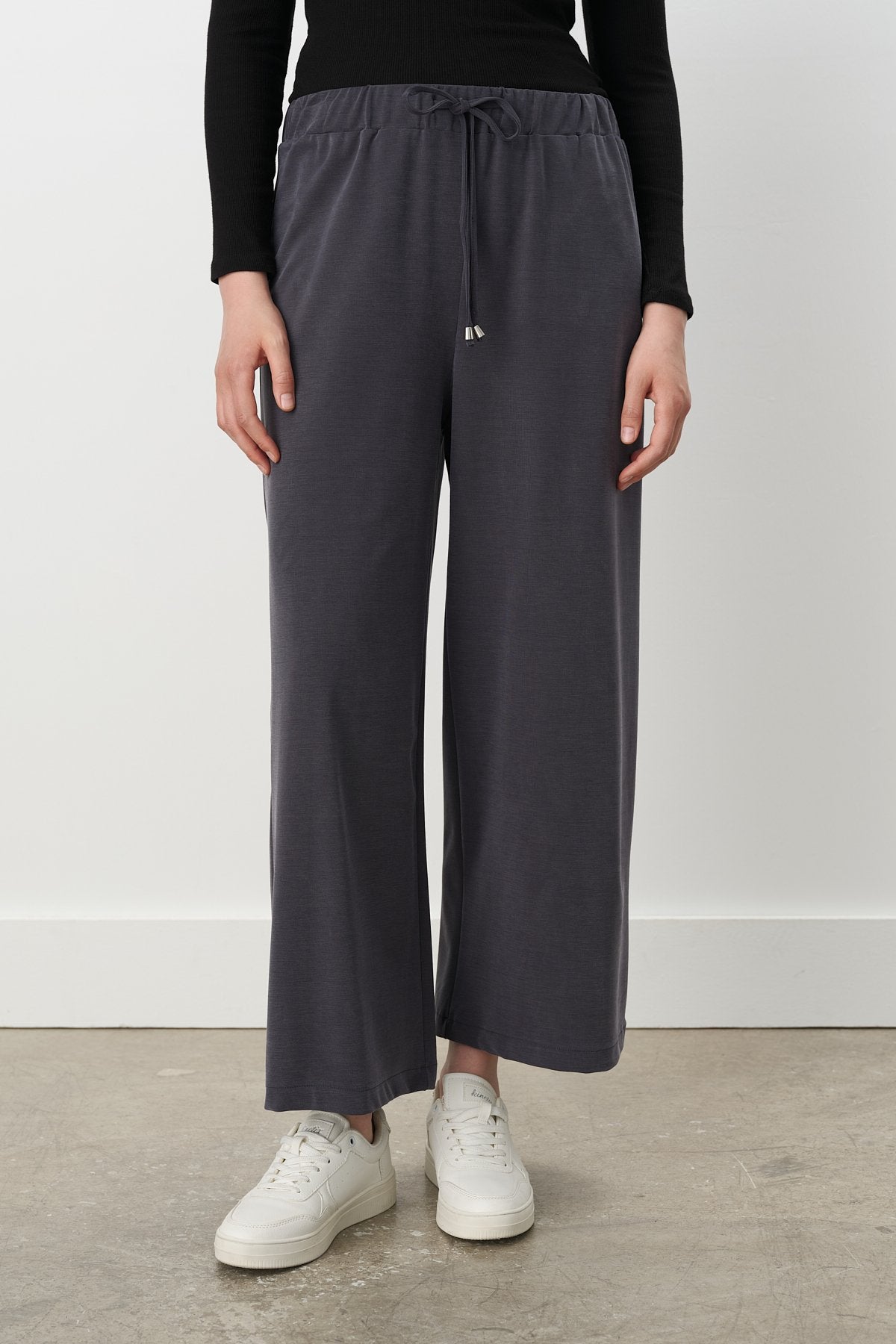 beli-lastikli-bol-paca-orme-pantolon-lacivert-250282.jpg