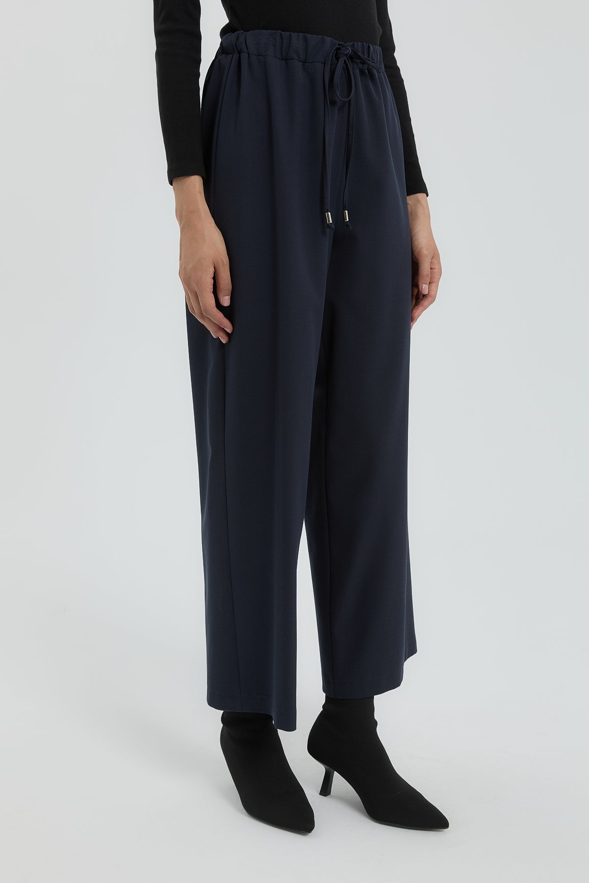 beli-lastikli-bol-paca-pantolon-lacivert-255930.jpg