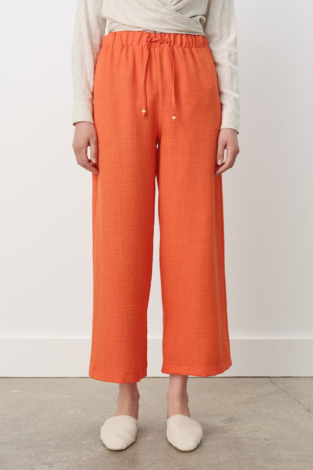 beli-lastikli-bol-paca-pantolon-oranj-250738.jpg