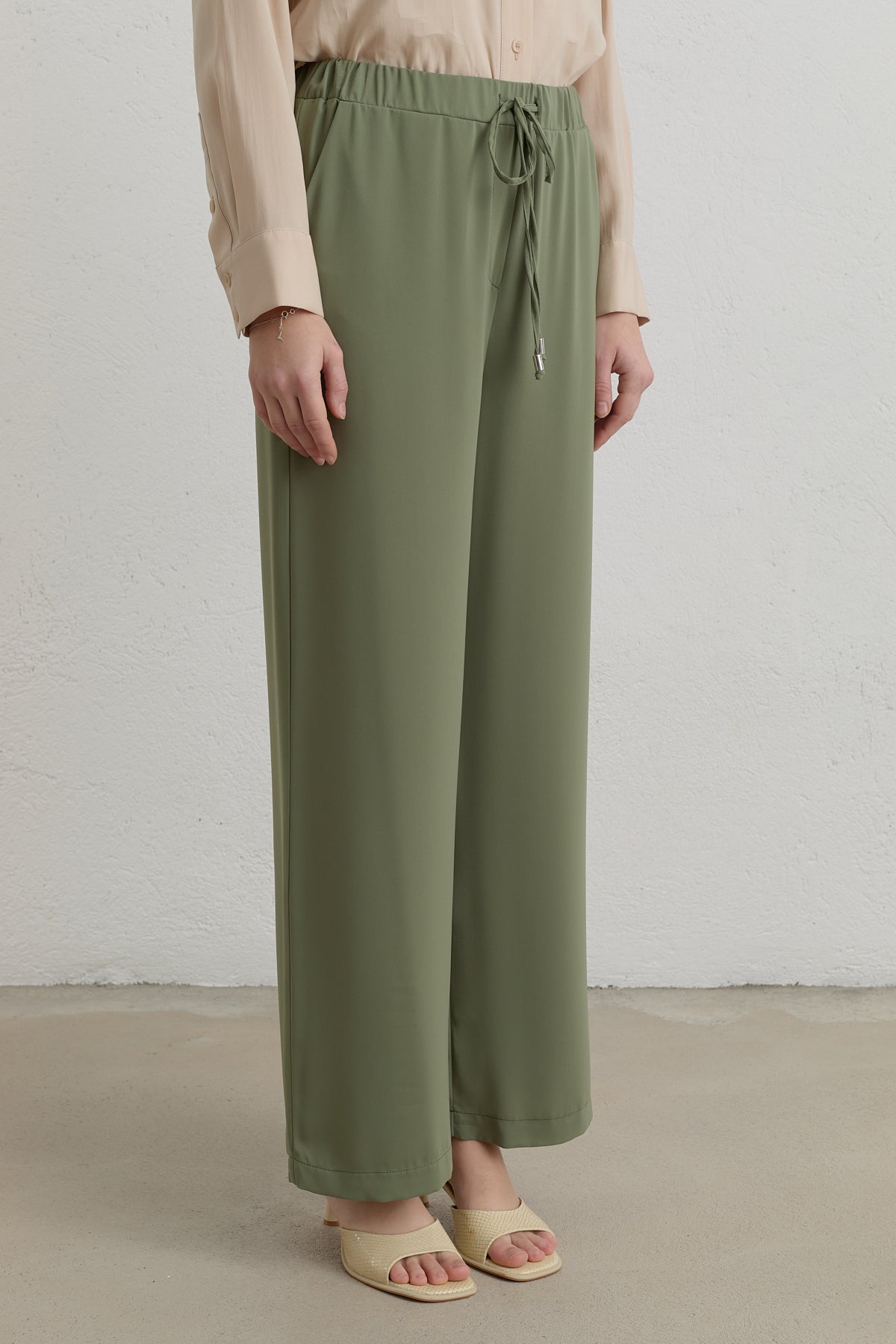 beli-lastikli-bol-paca-pantolon-yesil-261892.jpg