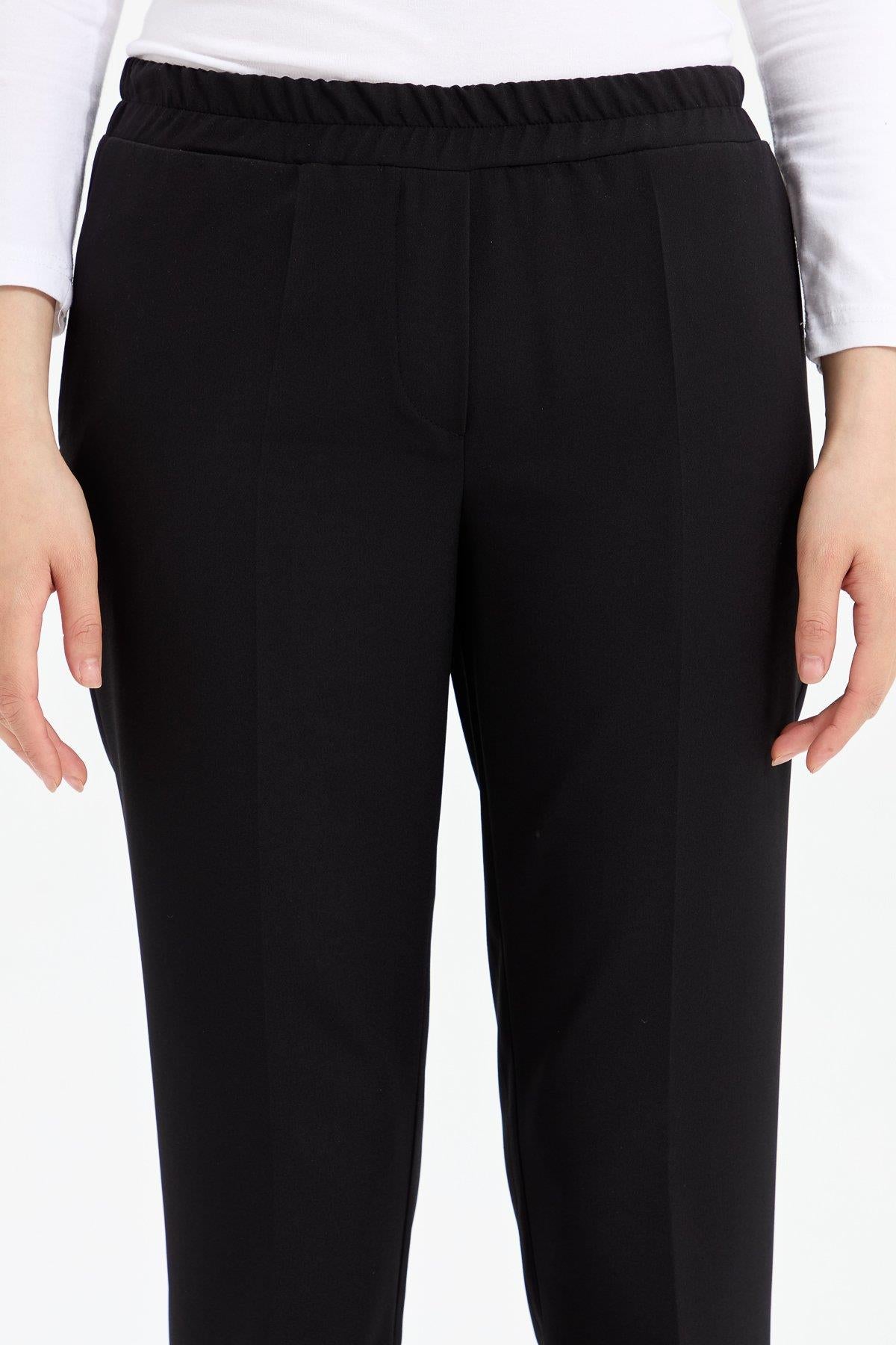 beli-lastikli-havuc-pantolon-siyah-250442.jpg