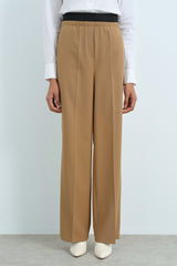 Wide-leg trousers with elasticated waist and crease detail - Camel