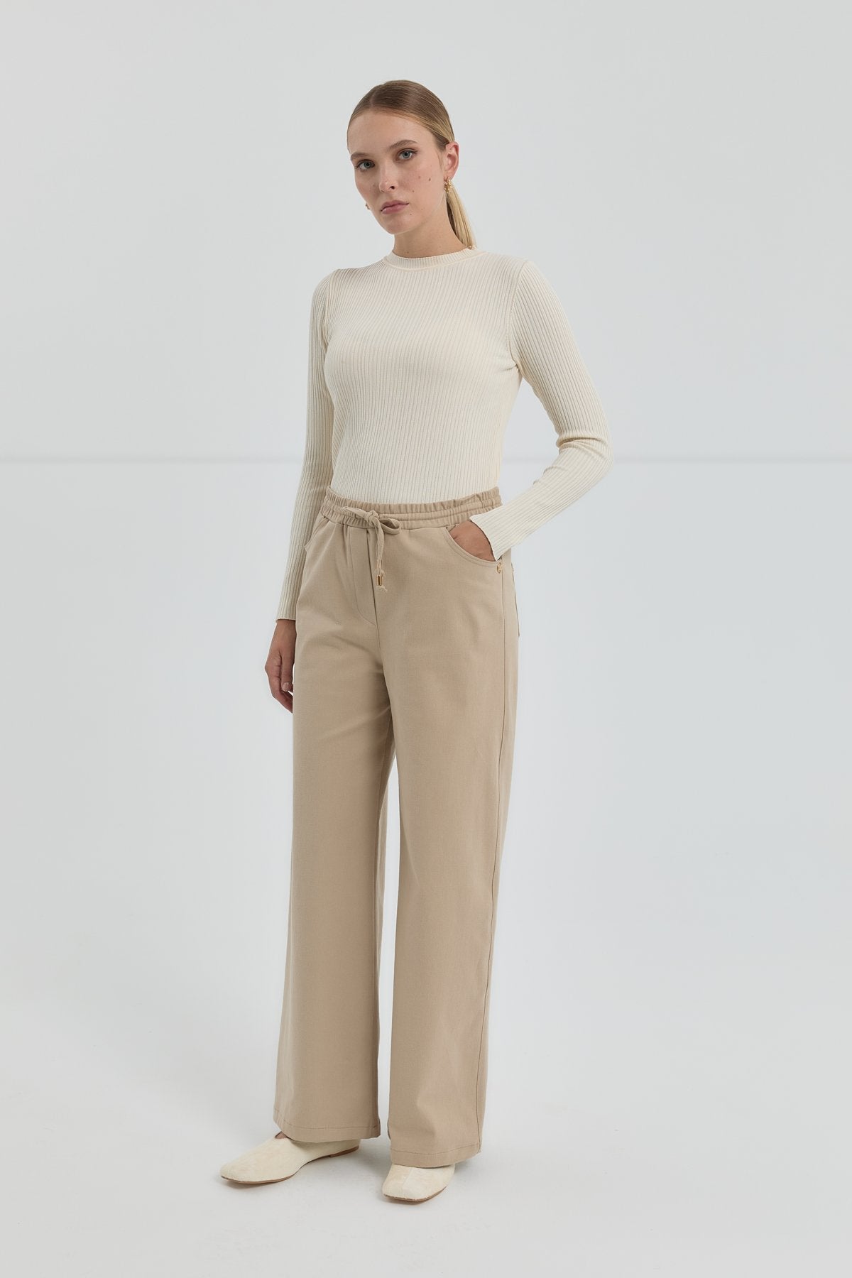 gabardin-beli-lastikli-bol-paca-pantolon-bej-254580.jpg