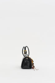 Black Cross-Body Bag with Flap and Charm Accessory