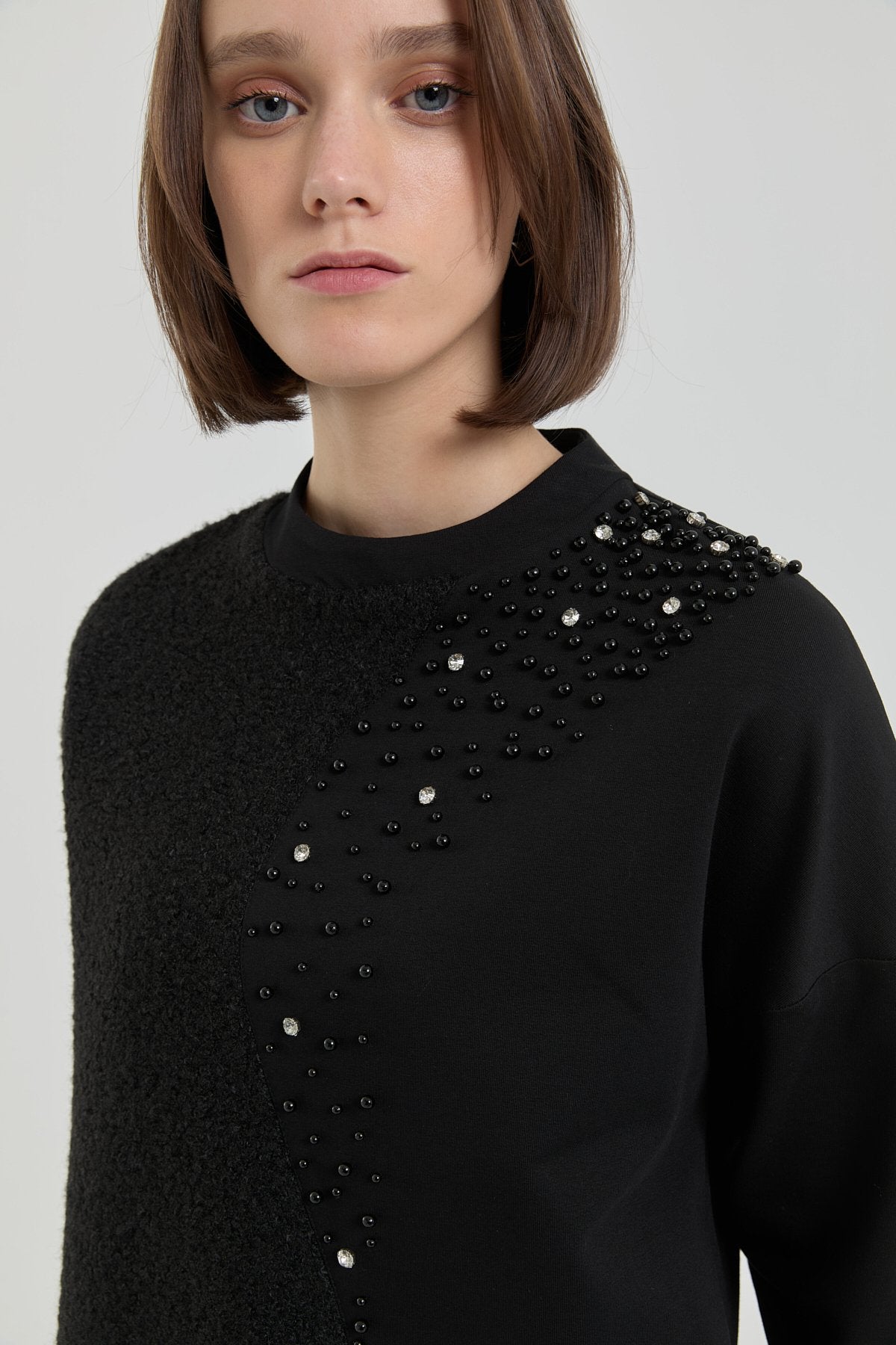 pelus-ve-tas-detayli-sweat-siyah-257978.jpg